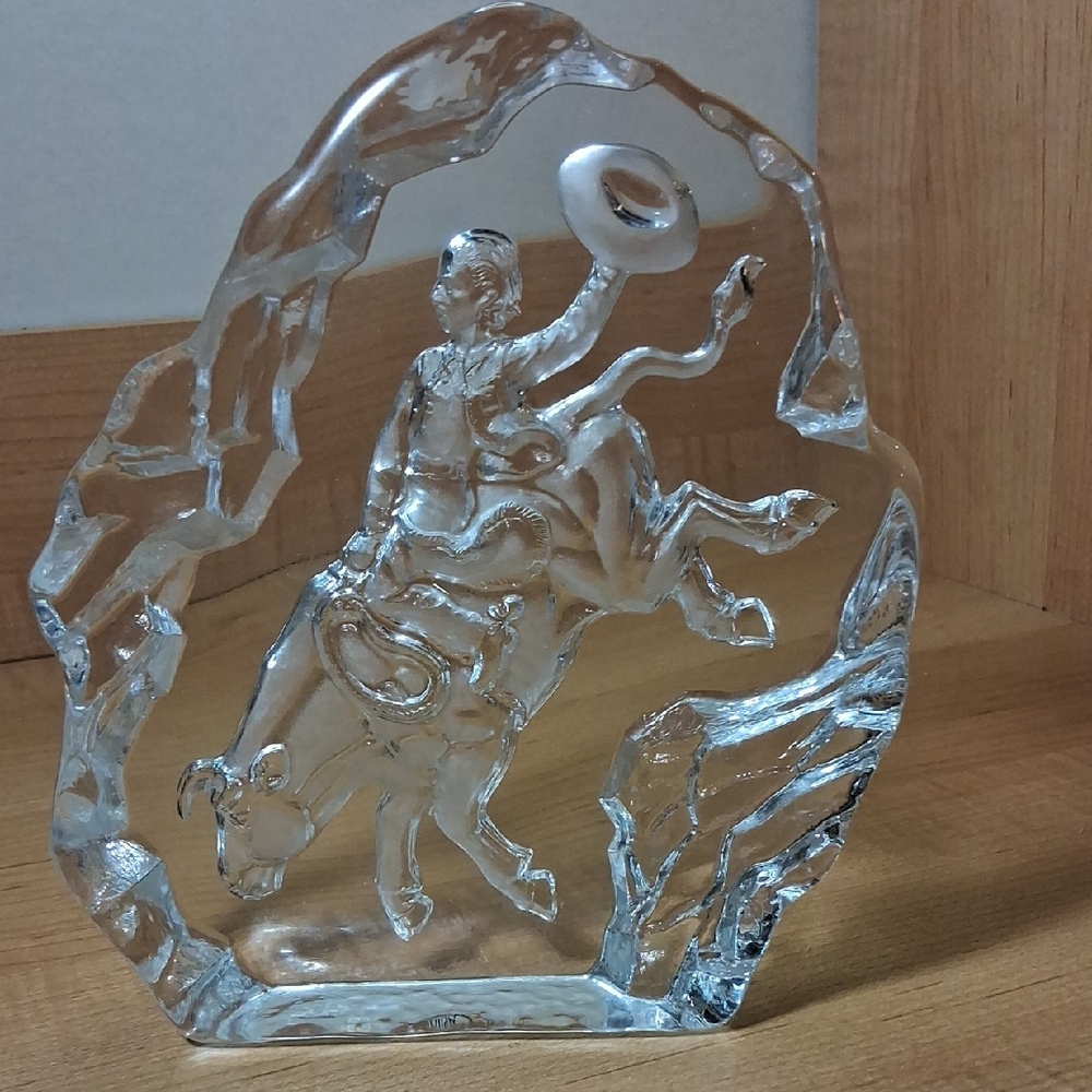 Cowboy riding Bull Glass paperweight